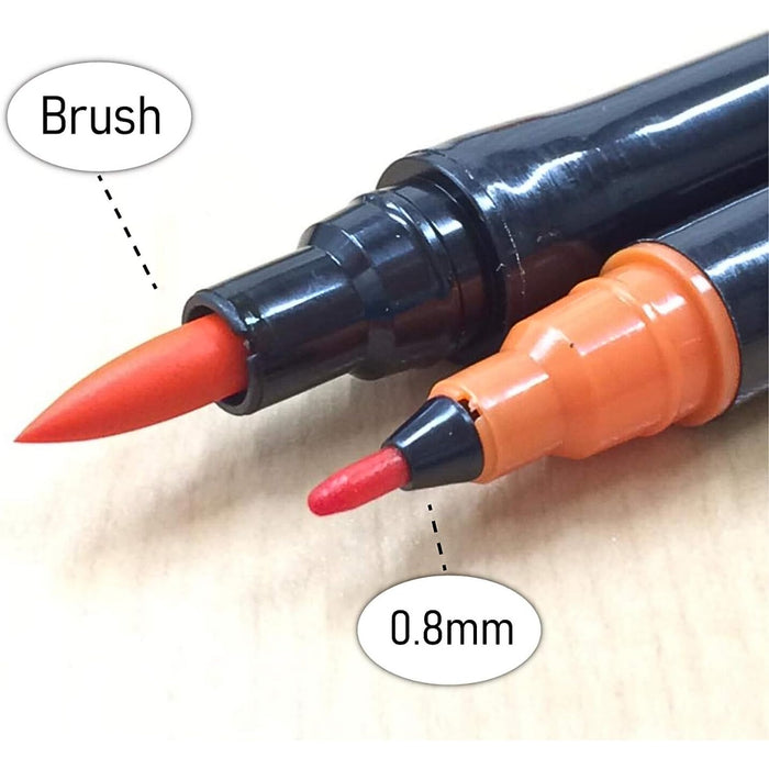 Close-up of brush and fine tips on Kuretake ZIG Art & Graphic Twin Marker showing dual-ended design.