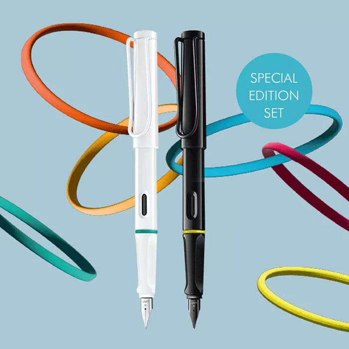Lamy Safari Multicolour Special Edition Fountain Pens in all white and all black shown side by side.