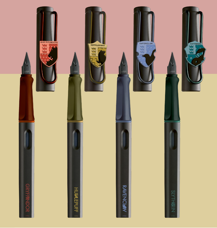 The Journal Shop - Close-up of the four Lamy Safari Harry Potter Fountain Pens representing Gryffindor, Hufflepuff, Ravenclaw, and Slytherin.