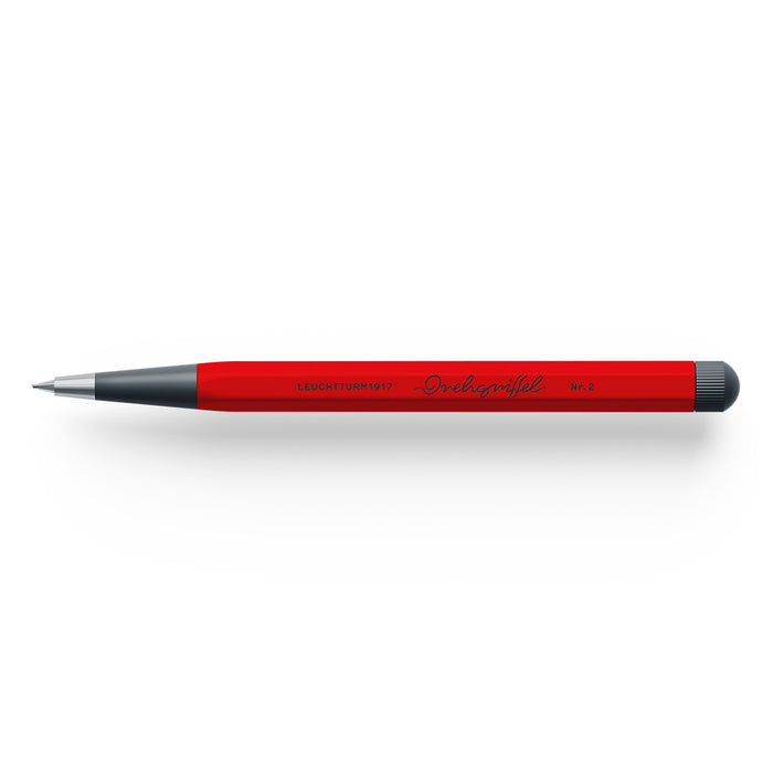 The Journal Shop - Red Leuchtturm1917 Drehgriffel Nr. 2 Pencil with black twist mechanism and pointed metal tip, shown horizontally.