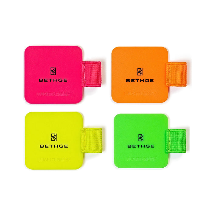 Four Leuchtturm1917 Luminous Edition pen loops in neon pink, orange, yellow and green