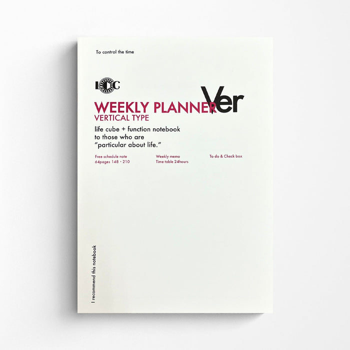 Crisp white cover of the L.C.C Weekly Planner Vertical Type notebook featuring bold typography and 24-hour timetable layout