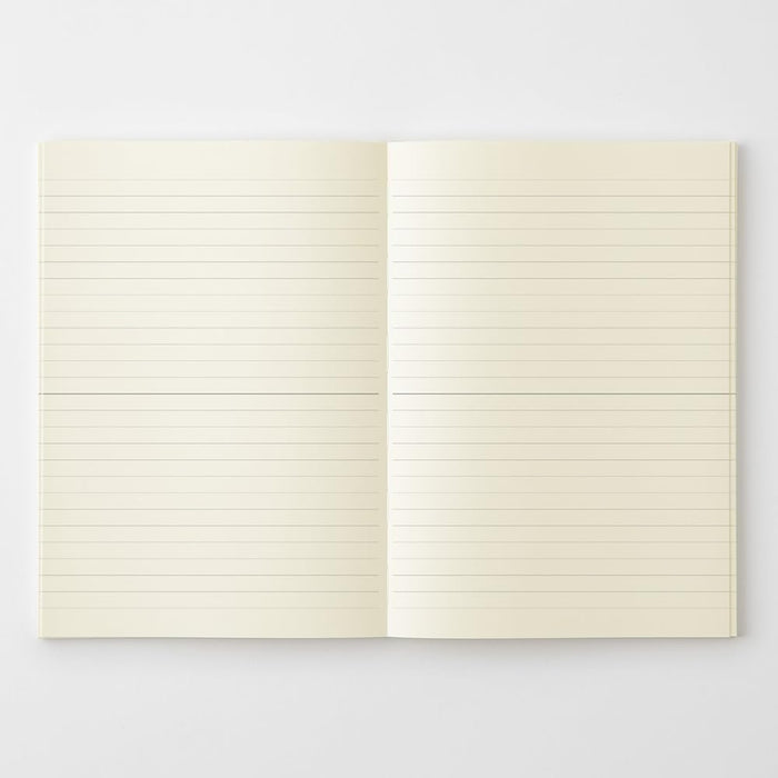 Midori MD Notebook A5 Lined opened flat displaying neatly ruled pages.