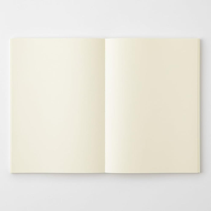 Midori MD Notebook A5 Plain opened flat displaying smooth blank pages.