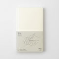 Midori MD Notebook Shinsho B6 Slim Lined with minimalist cream cover and subtle MD branding.