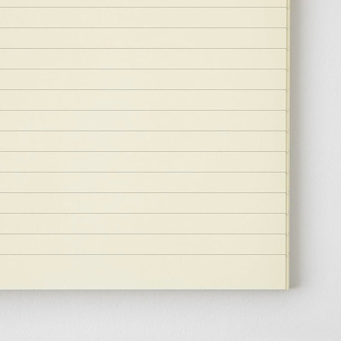 Close-up of Midori MD Notebook Shinsho B6 Slim Lined showing horizontal ruling on MD paper.