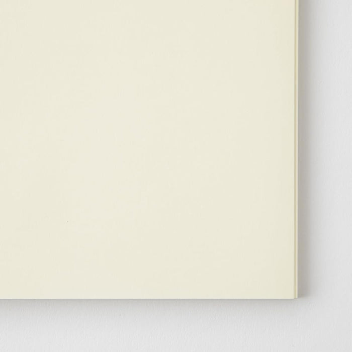Close-up of Midori MD Notebook Shinsho B6 Slim Plain cream MD paper texture.