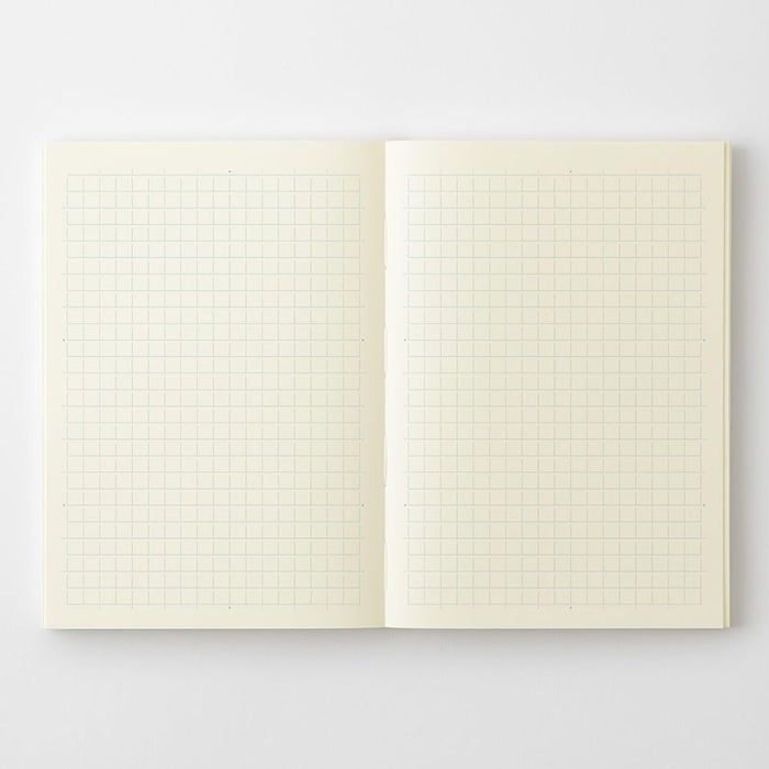 Midori MD Notebook Paperback A6 Grid showing cream MD paper with square grid layout.