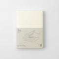 Midori MD Notebook Paperback A6 Ruled with minimalist cream cover and subtle MD branding.