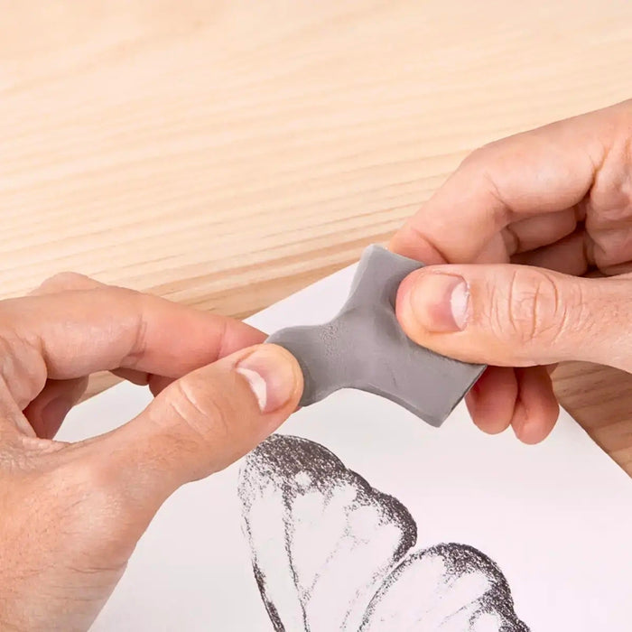 Milan Kneadable Erasers 1220 being shaped by hand for precision erasing
