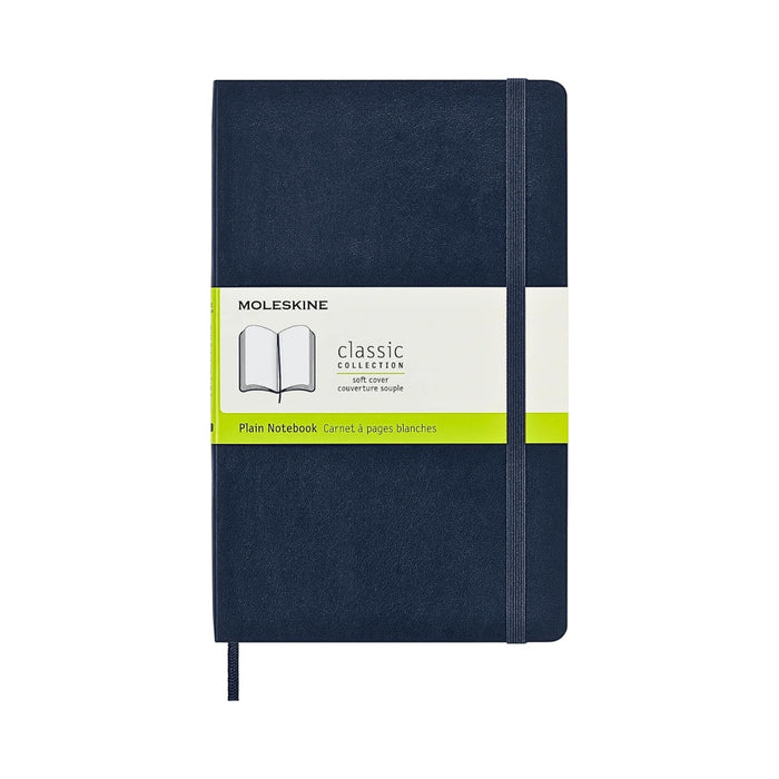 Front view of the Moleskine Classic Soft Cover Notebook in Sapphire Blue with a cream paper sleeve label.