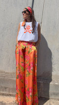 Pantalón Signature "Éclat d'Orange" con pañuelo a conjunto de cortesía