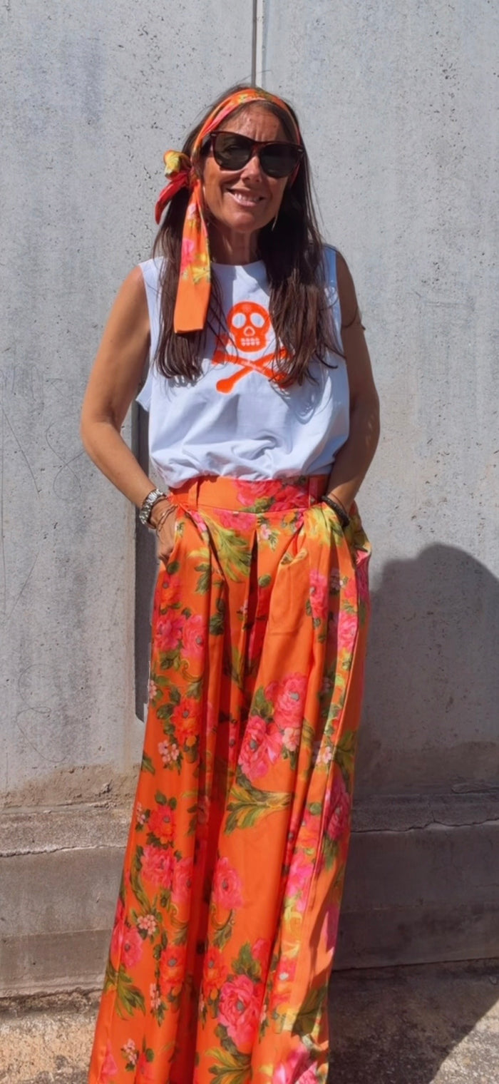 Pantalón Signature “Éclat d’Orange” incluye solo ahora pañuelo a conjunto de cortesía.