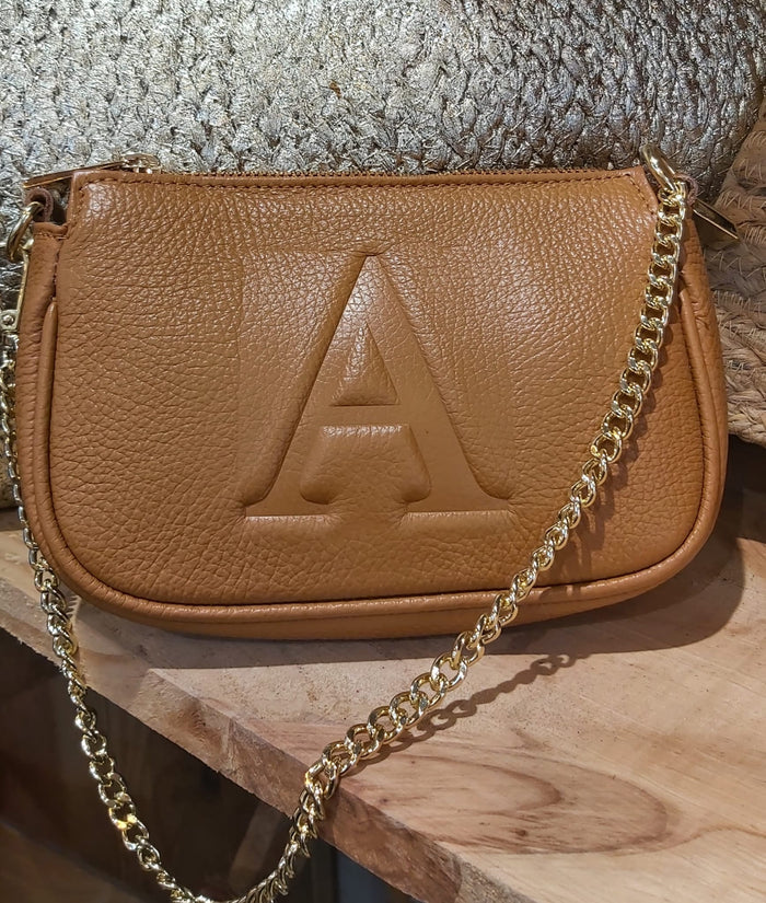 Pochette cuero personalizado