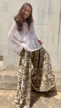Poncho "Olas de Marfil" de punto calado blanco, estilo boho