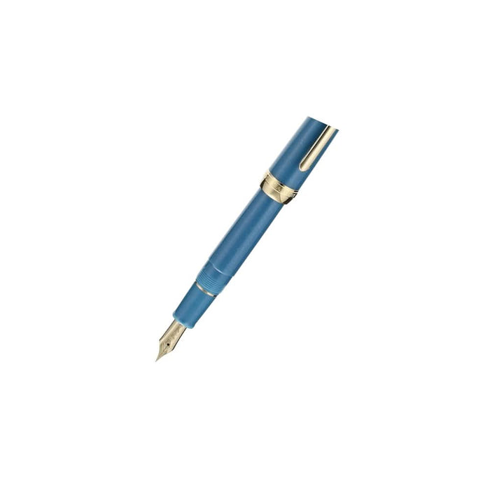 Angled view of Sailor Shikiori Frost Night fountain pen showing blue barrel and gold detailing.