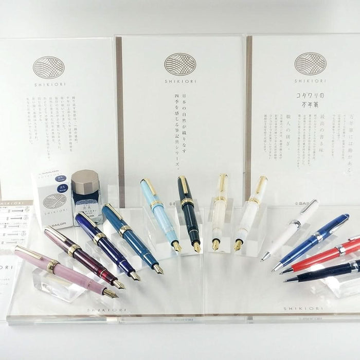 Sailor Shikiori Frost Night fountain pen presented with full Shikiori seasonal pen collection display.