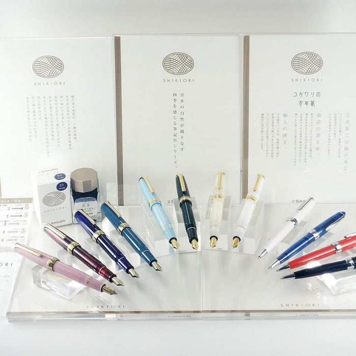 Selection of Sailor Shikiori fountain pens in assorted colours arranged on acrylic stands.