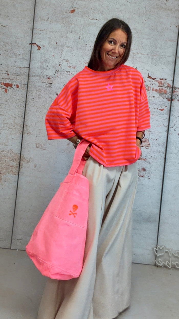 Sudadera "orange juice" rosa flúor de mangas abullonadas