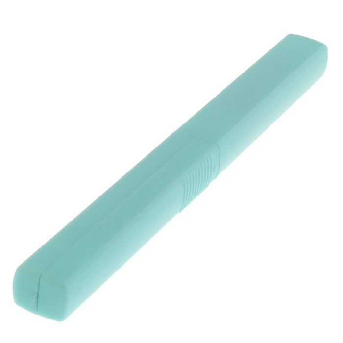 Angled view of Sun-Star Akeruno Stickyle scissors and box cutter in turquoise, closed with cap on.