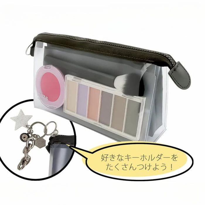 Sunstar Mitte gusset clear pouch in light black filled with stationery and accessories.