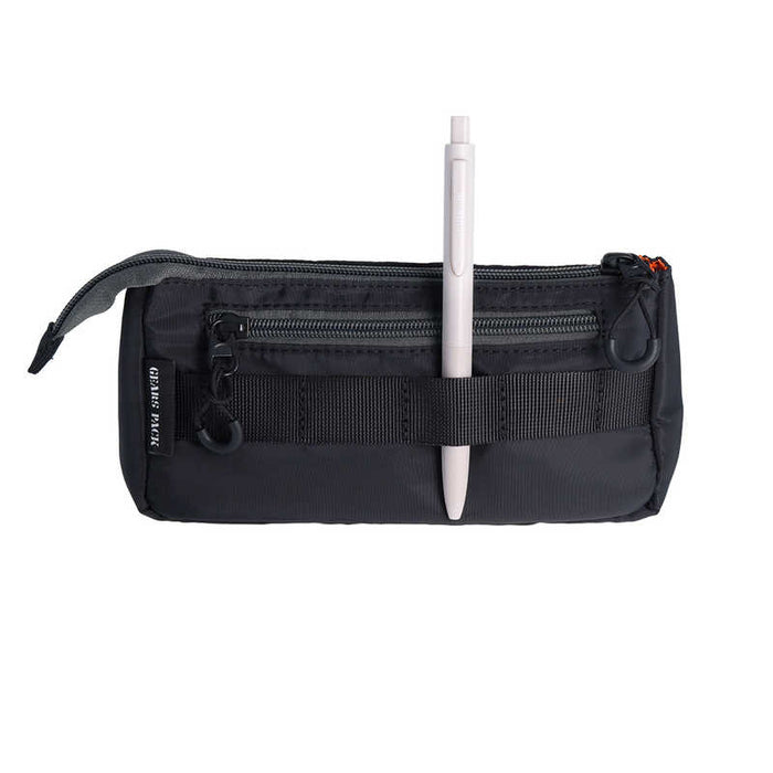 The Journal Shop - Black Sun-Star Gears Pack pencil case holding pen through elastic strap.