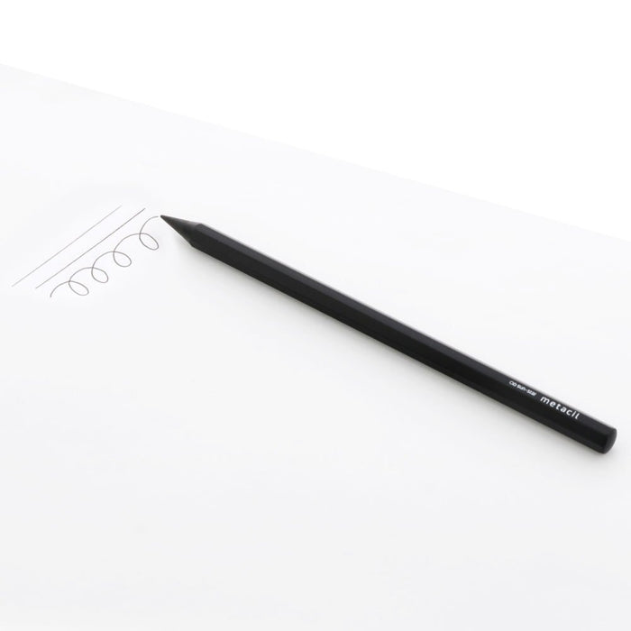 Sun-Star Metacil Metal Lead Pencil in black shown writing on white paper with lines and loops.