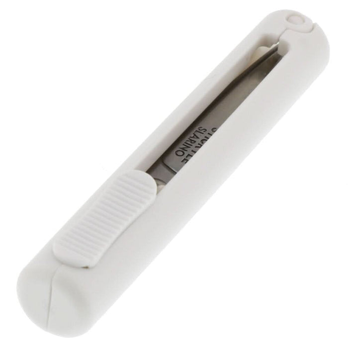 Angled view of Sun-Star Slarino Stickyle white retractable scissors with blades inside casing.