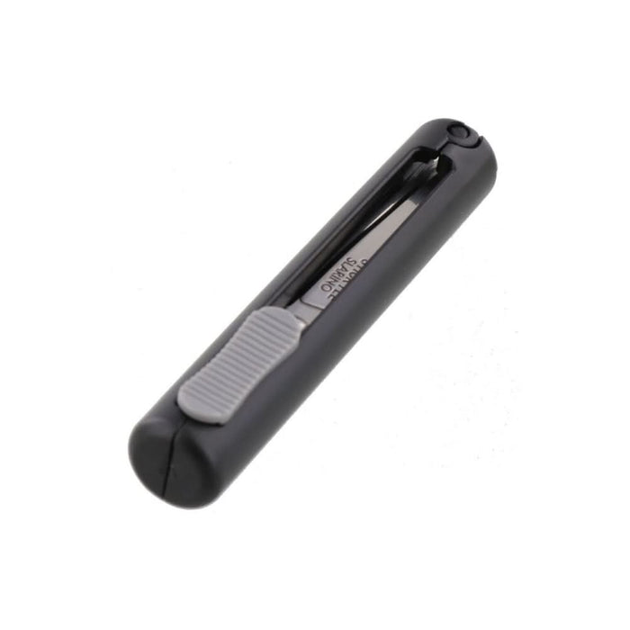 Angled view of Sun-Star Stickyle Slarino black retractable compact scissors with sliding mechanism visible.