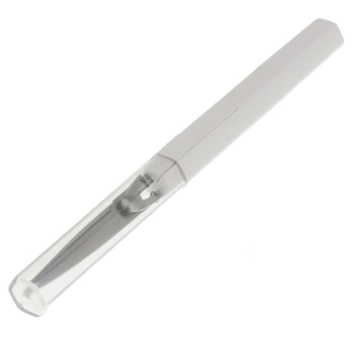 Sun-Star Stickyle Tatsuno compact scissors in white, opened with clear cap removed.