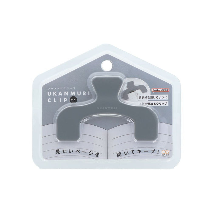Front view of the Sun-Star Ukanmuri Petite Clip packaging showing the clip displayed above an open notebook illustration.