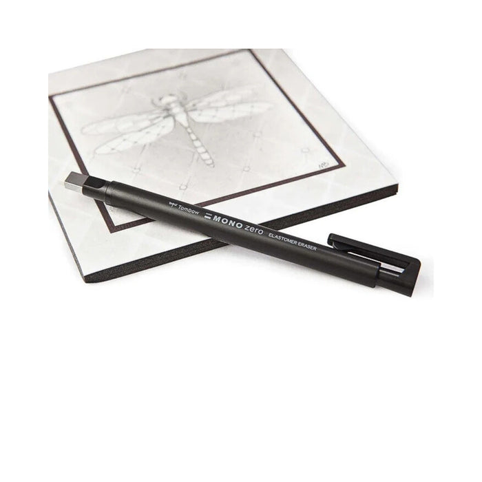 Tombow MONO Zero square retractable eraser used on a technical drawing for precise corrections.