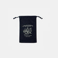 Front view of the black Tools To Live By canvas dust bag with printed design.
