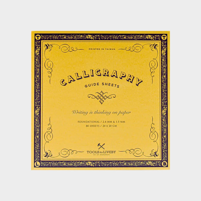 Front cover of Tools To Live By Chancery Cursive calligraphy practice notebook in yellow with decorative border.