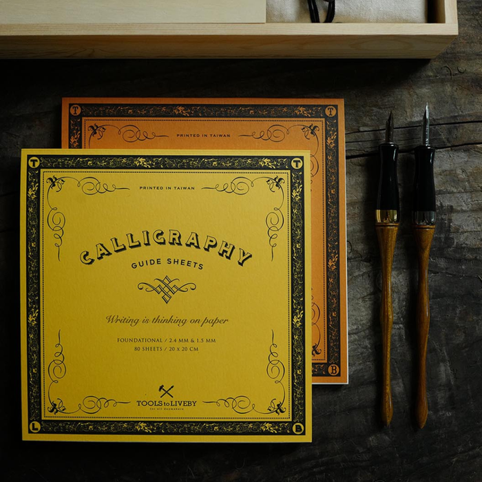 Tools To Live By Calligraphy Practice Notebook — Chancery Cursive, shown from the front.