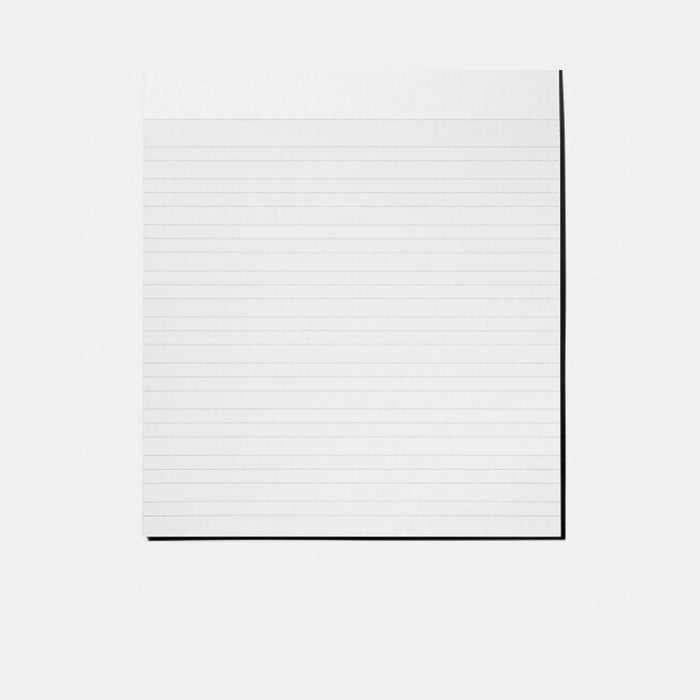 Lined practice page designed for calligraphy strokes and lettering alignment.