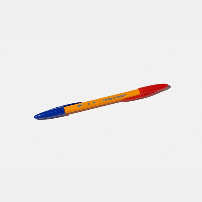 Red Blue - Angled view of the Tools To Live By dual-tip ballpoint pen highlighting the red and blue tips.