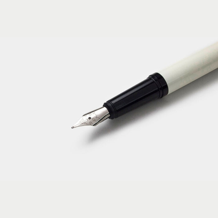 Close-up of the metal nib on the Tools to Live By Le Chat fountain pen.