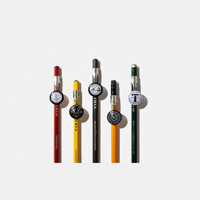 Tools To Live By pencil topper pocket clips fitted onto coloured pencils.