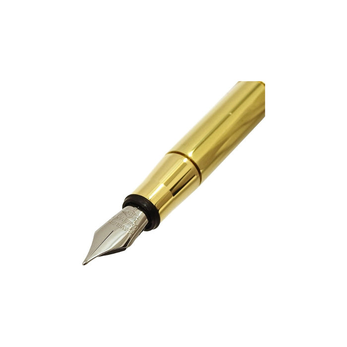 Close-up of the Midori Compact Brass Fountain Pen in gold, showing fine stainless steel nib with polished brass grip.