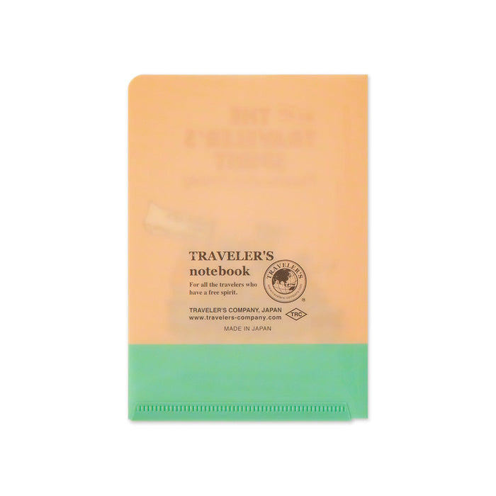 Reverse side of Traveler’s Notebook 2026 Edition Clear Folder Passport Size showing text details and plain design.