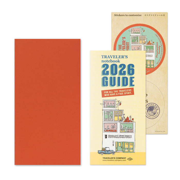 Traveler’s Notebook 2026 Monthly Diary Refill Regular Size shown on a desk with packaging and stickers.