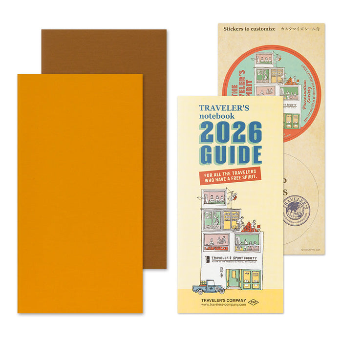 Traveler’s Notebook 2026 Weekly Vertical Diary Refill Regular Size set of two, shown with kraft cover and additional inserts.