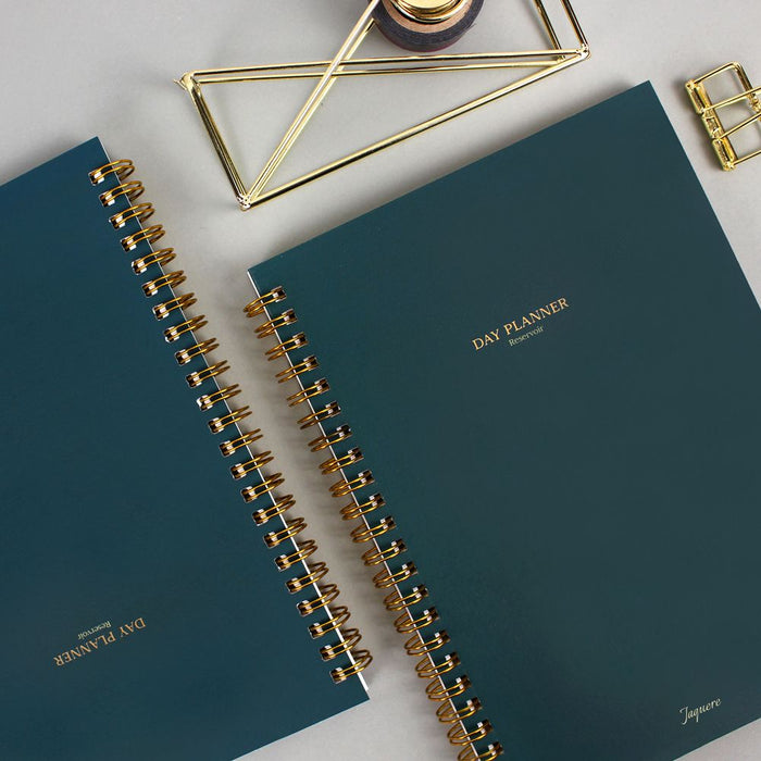 Wearingeul Daily A5 soft cover planner in deep green with gold spiral binding.