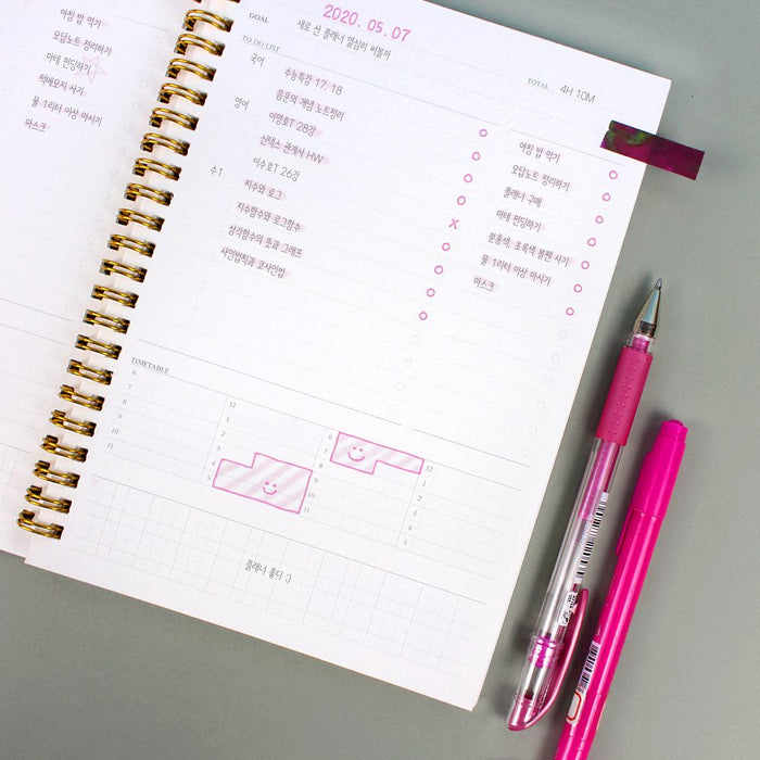 Open Wearingeul Daily A5 soft cover planner showing structured daily planning pages.