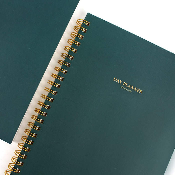 Front cover of Wearingeul Daily A5 soft cover planner in dark green.