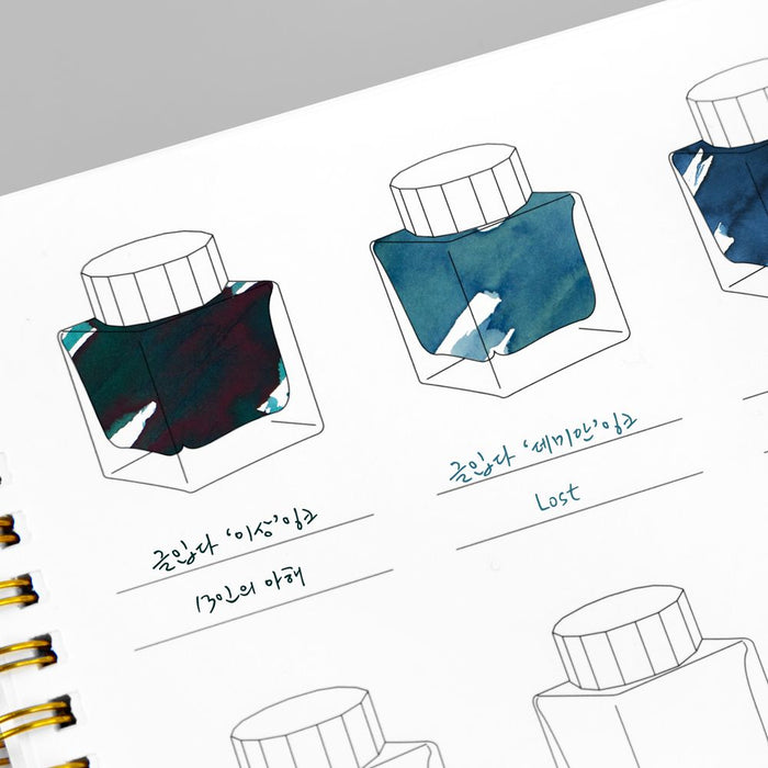 Close up of filled ink jar swatches in Wearingeul Ink Colour Swatch Book A5.