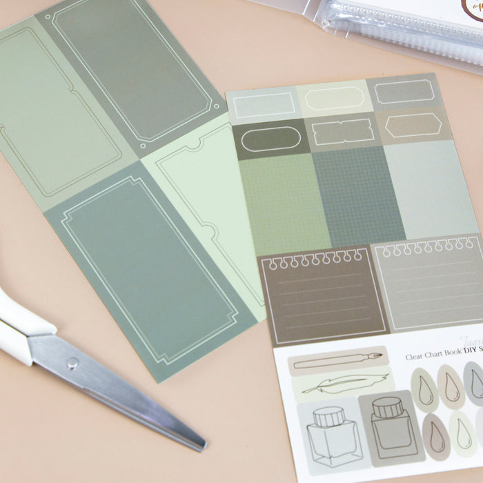 Wearingeul ink transparent card binder arranged with notebooks and stationery.