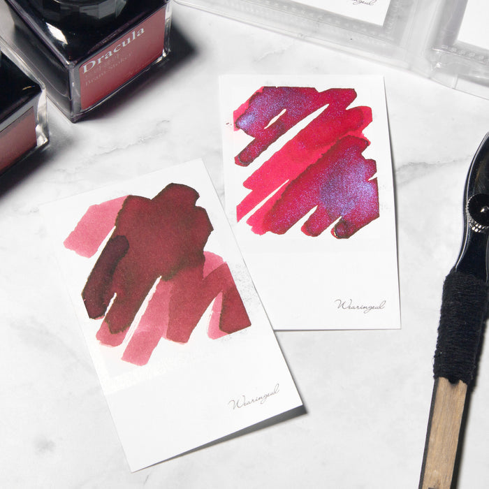 Wearingeul Instant Film Colour Swatch with bold red fountain pen ink swatches.