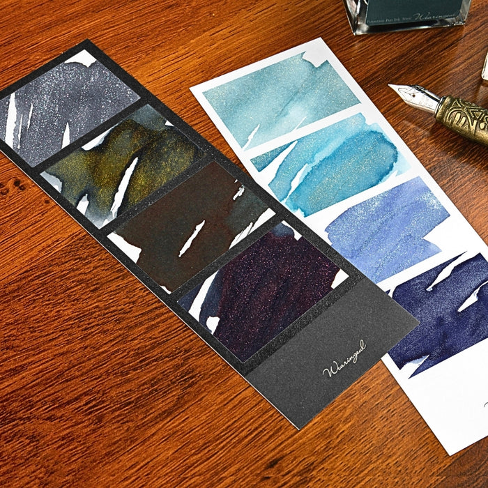 Black and White - Wearingeul Instant Four Photos Colour Swatch booklet open showing multiple ink samples.